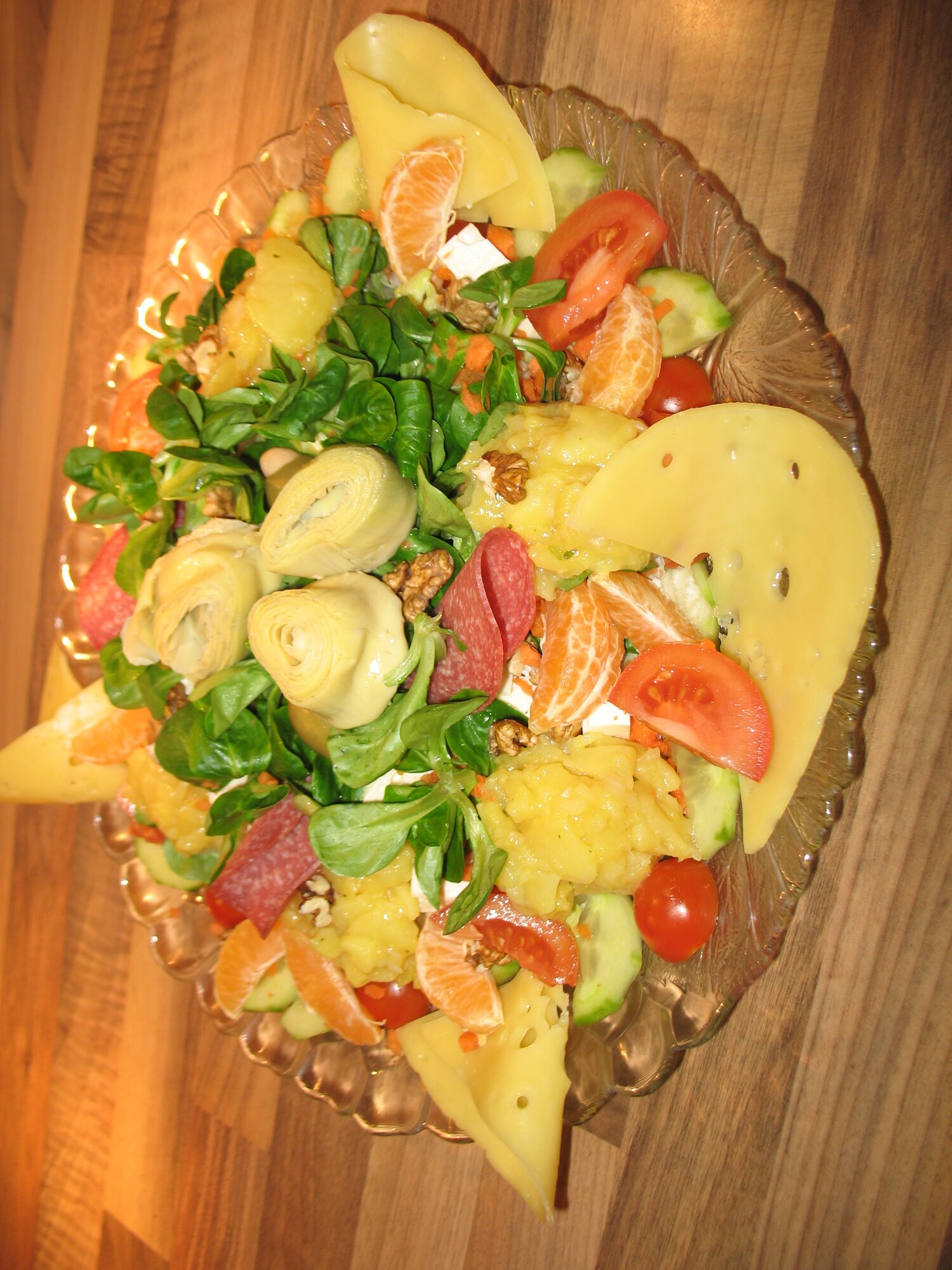 SPANGDAHLEM AIR BASE, Germany -- To get in shape for spring, eat lighter and focus more on foods that are rich in vitamins, minerals, fiber and whole-grain products. In addition, eat less fat, fewer sweets, less animal protein and plenty of fresh salads, vegetables, potatoes and fruit. Any salad like this one, including lettuce, artichokes, tomatoes, walnut, fruits and other healthy and low fat items is a great way to start. (U.S. Air Force photo/Iris Reiff)