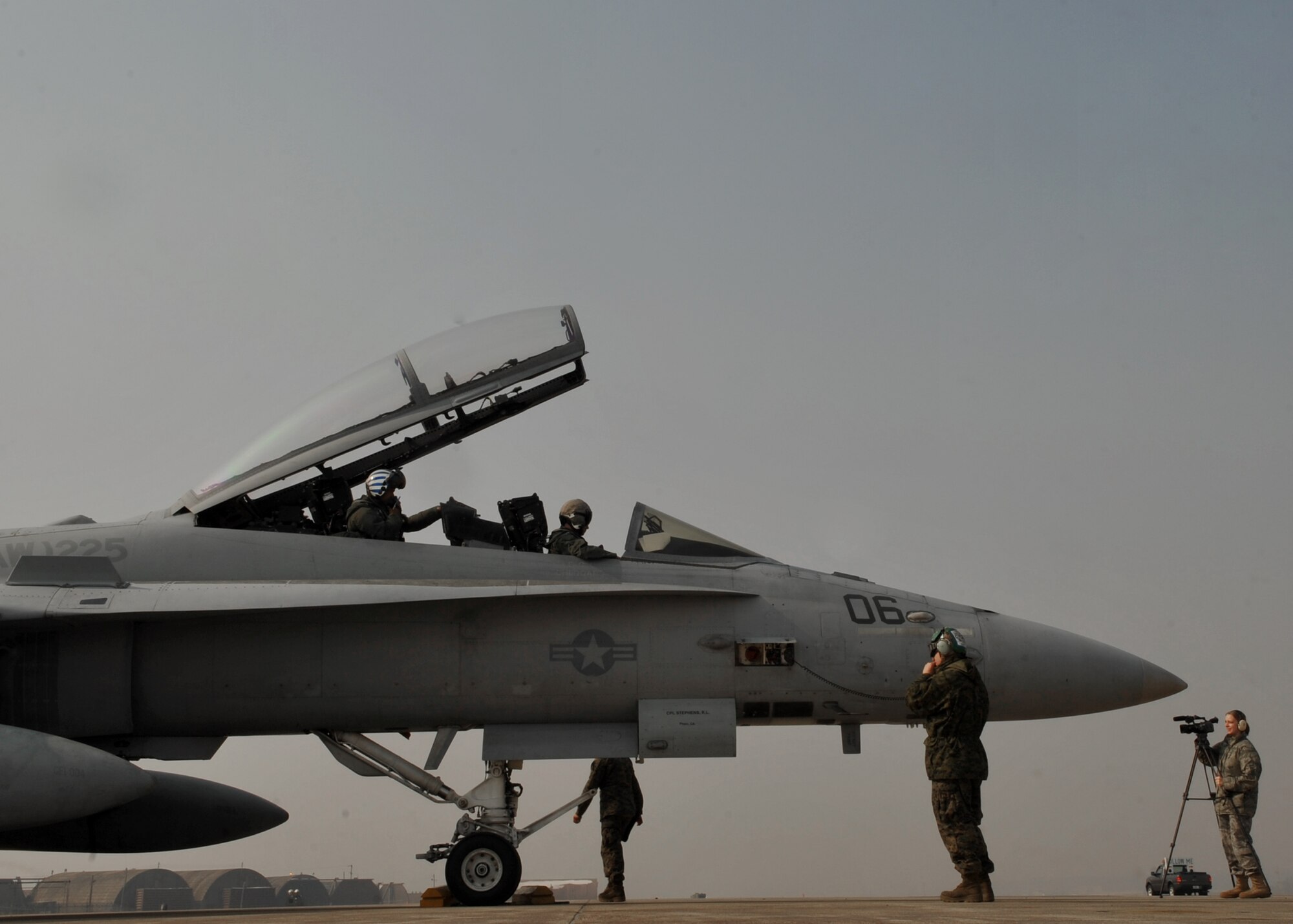 Marine maintainers from the Marine Fighter Attack Squadron 225 inspect an F-18 Hornet at Osan Air Base, Republic of Korea, Feb. 2. The Marine squadron is currently on their unit deployment program, where they go to Marine Corps Air Station Iwakuni for six months in which they travel around the Pacific region for a few weeks at a time to train their aircrew in different environments. (U.S. Air Force photo/Senior Airman Evelyn Chavez)
