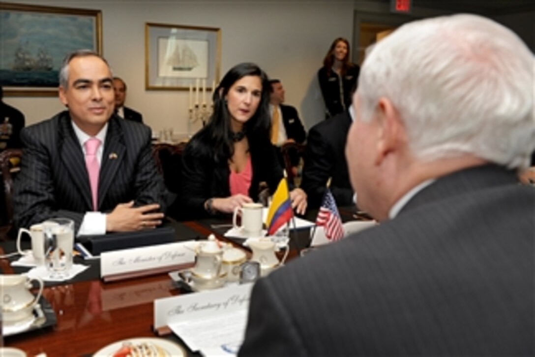Colombian Defense Minister Rodrigo Rivera (left) meets with Secretary of Defense Robert M. Gates (right) in the Pentagon for bilateral security discussions on Feb. 3, 2011.  Joining Rivera is Vice Minister of Defense for Strategy & Planning Yaneth Giha (2nd from left).  