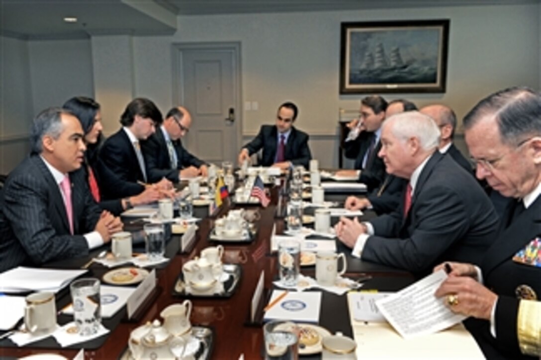 Colombian Minister of Defense Rodrigo Rivera (left) and some of his senior advisors participate in bilateral security discussions in a Pentagon meeting hosted by Secretary of Defense Robert M. Gates (2nd from right) on Feb. 3, 2011.  Joining Gates for the talks is Chairman of the Joint Chiefs of Staff Adm. Mike Mullen (right).  