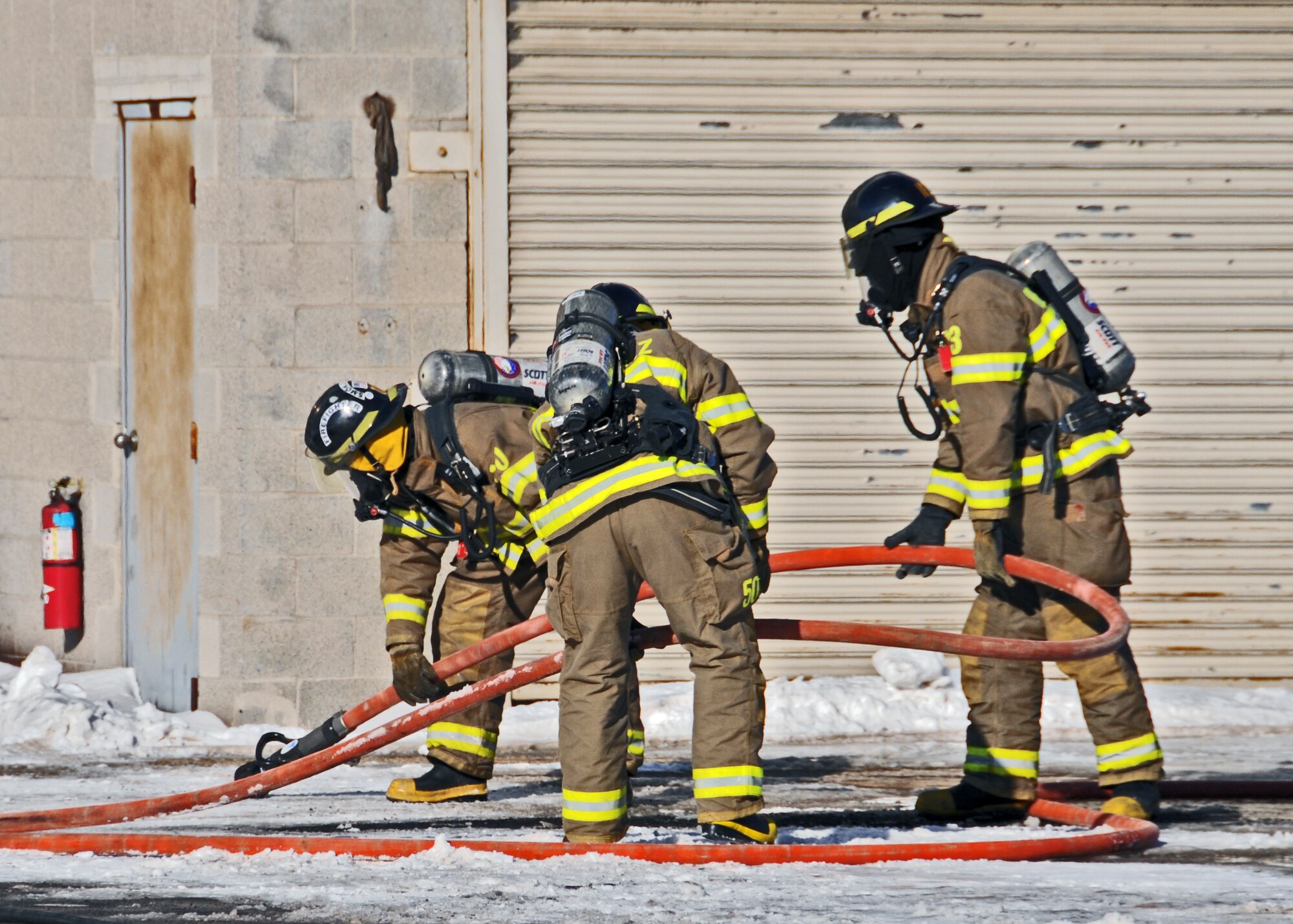 Niagara Falls Air Reserve Station Fire Department assists local first responders during a fire and hazardous waste incident at Saint-Gobain Ceramic Materials, February 4 2011, Wheatfield NY. The fire was extinguished by civilian firefighters, but due to leaking chemicals, the Niagara County and Niagara Falls Airbase Hazmat teams also responded to clean up the spill. (U.S. Air Force photo by Staff Sgt. Joseph McKee)