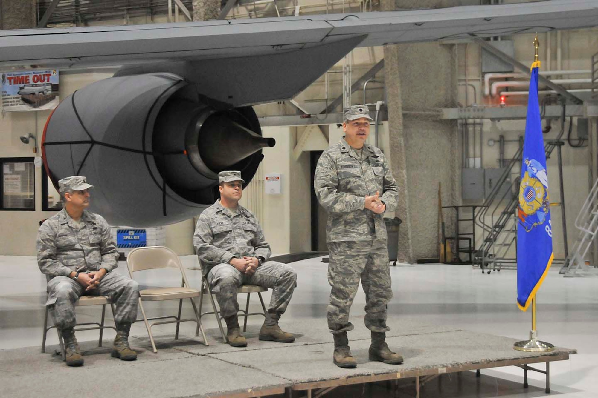 Lt. Col. Daniel S. Yenchesky, commander of the 128th Air Refueling Wing maintenance group, gives his opening address to gathered Airmen following his induction as the new maintenance group commander.  Yenchesky assumed command from Col. James Locke, who will go on to command the 128th Air Refueling Wing operations group.  (U.S. Air Force photo by Master Sgt. Kenneth Pagel / Released)