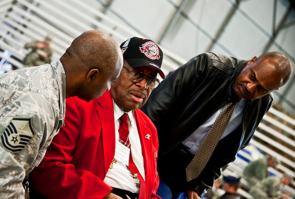 Chief Master Sgt. (ret) Walter Richardson, speaks with other attendees after the birthday celebration Feb. 3 at Eglin Air Force Base, Fla.  The chief joined the military in 1949 and served in the famous "Tuskegee Airmen," an Army Air Corps program that trained African Americans to fly and maintain combat aircraft. Later in Chief Richardson's career, he served as an aircraft mechanic at Eglin and retired from Hulburt Field.  (U.S. Air Force photo/Samuel King Jr.)