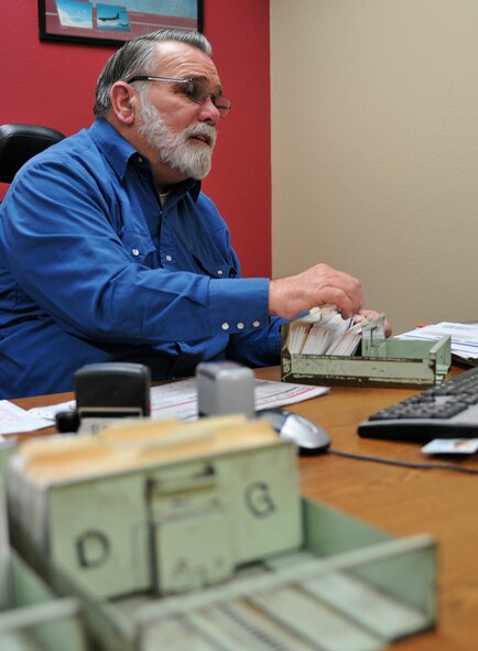Kenneth Middleton, 2nd Communications Squadron postal clerk, sorts mail at the dormitory postal center on Barksdale Air Force Base, La., Feb. 7. Mail that continues to be delivered after an airman moves out of the dorms must be readdressed and forwarded to them at their new residence. (U.S. Air Force photo/Senior Airman Chad Warren)(RELEASED)
