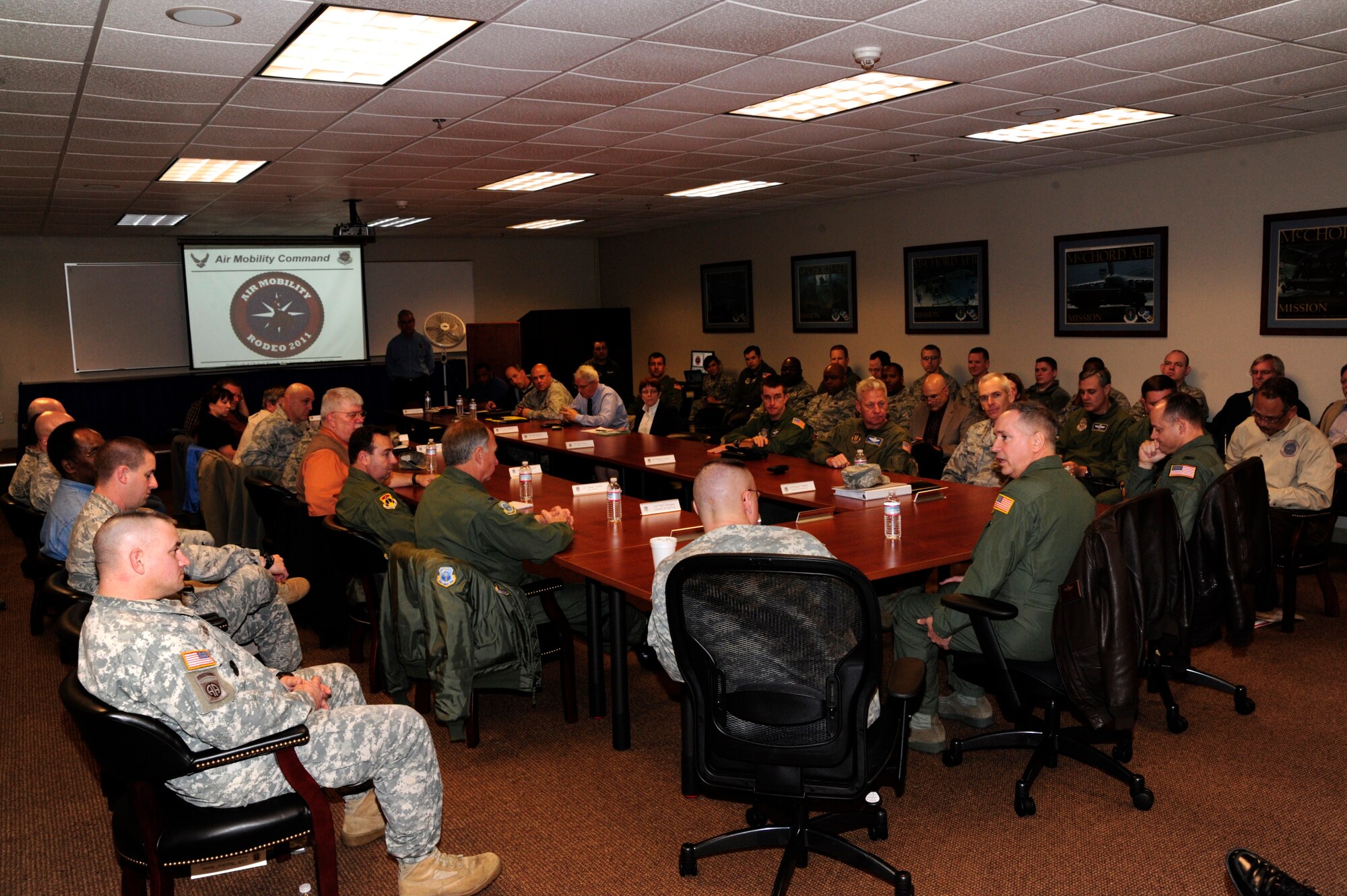 Brigadier Gen. Rick Martin addresses Joint Base Lewis-McChord leaders at the RODEO in progress review Jan. 26 at JBLM, WA. The review allows Air Mobility Command functional managers to interact with local subject matter experts to ensure RODEO is well-planned and executed. (U.S. Air Force photo/Master Sgt. Chris Haylett)