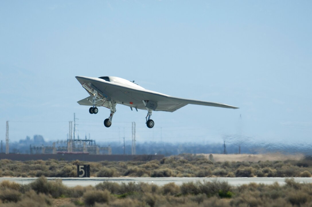 A Navy X-47B Unmanned Combat Air System Demonstration aircraft takes off and flies for the first time Feb. 4, 2011, at Edwards Air Force Base, Calif. The Northrop Grumman-built aircraft flew for 29 minutes during the flight test. (U.S. Air Force photo/Rob Densmore)
