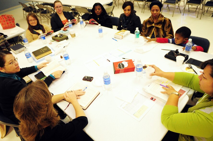 Members of the Protestant Women of the Chapel group engage in Bible study discussion in the Chapel 2 annex located on Barksdale Air Force Base, La., Feb. 3. The mission of PWOC is to help military chaplains foster Christian fellowship and spiritual growth among women on military bases and in communities. (U.S. Air Force photo/Senior Airman Joanna M. Kresge)
