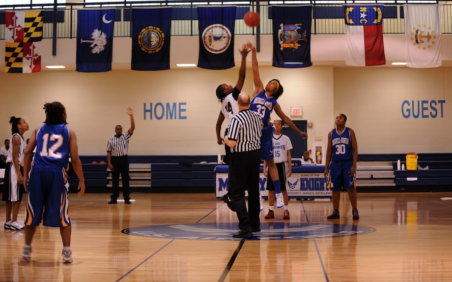 MOODY AIR FORCE BASE, Ga. -- Altanee Manor, Moody’s “Lady Knights” varsity basketball team member, attempts to win the tip-off against a player from Maxwell Air Force Base, Ala., Feb. 5. Though the “Maxwell-Gunter” team won the tip- off, Ashley Searcy, Lady Knights shooting guard, made the first basket of the game. (U.S. Air Force photo/Airman 1st Class Douglas Ellis)(RELEASED)
