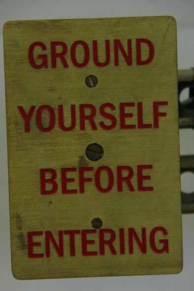 A grounding panel attached to the internal metal structure of the 911th Aircraft Maintenance Squadron’s Fuel Cell Hanger displays instructions needed for personnel entering the hanger. The hanger was the site of the annual fuel extraction exercise held here during the February Unit Training Assembly. The exercise tested the emergency response readiness of both fuel systems specialists and Allegheny County Airport Authority personnel while in the confines of the hazards presented in the hanger.
