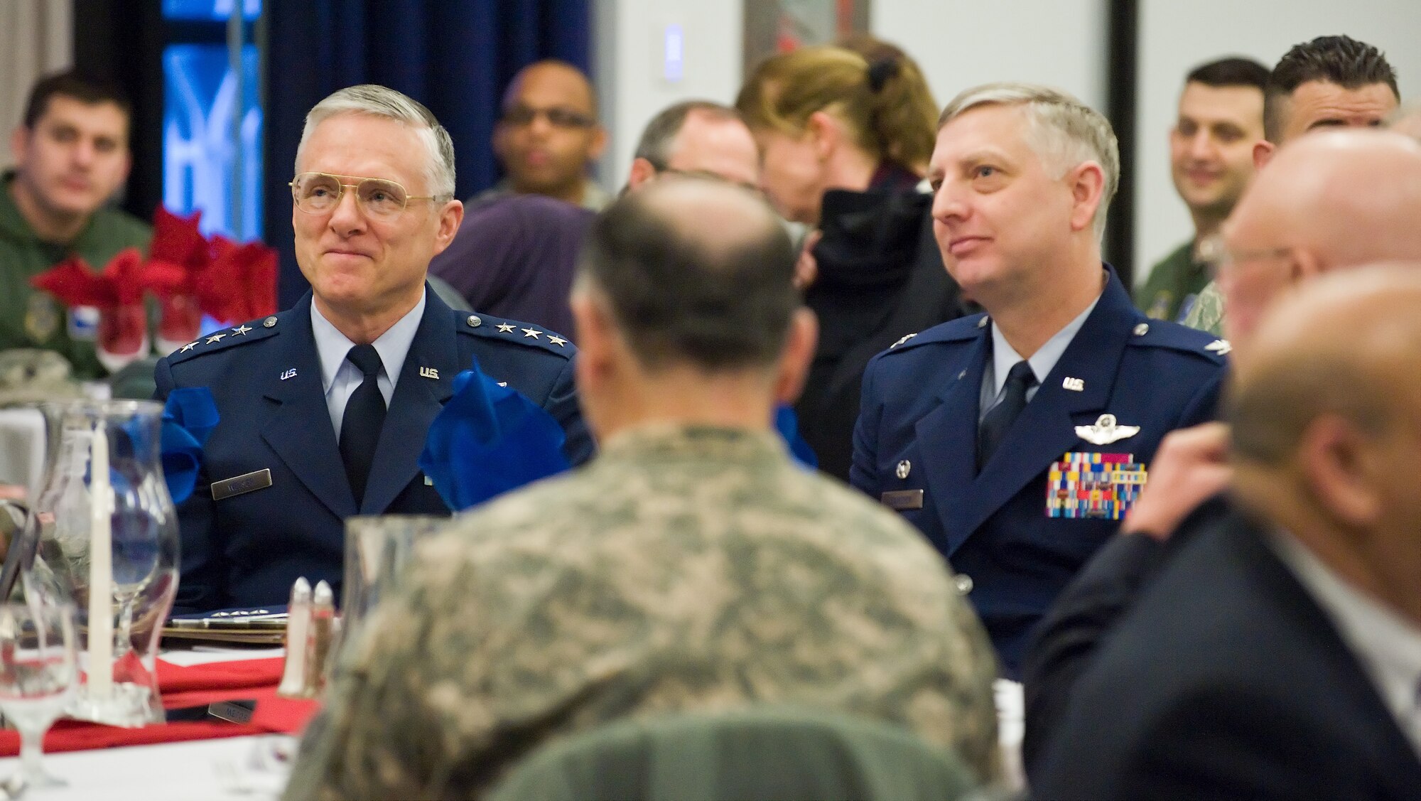 Lt. General William Welser III (ret.) sits with Col. Mark Camerer at the National Prayer Breakfast at Dover AFB, Del., Feb. 4, 2011. General Welser was invited to the breakfast as the key-note speaker. The morning started with the history of the National Prayer Breakfast and was followed by a speech on the power of prayer by General Welser. The closing remarks came from Colonel Camerer. (U.S. Air Force photo/Roland Balik)