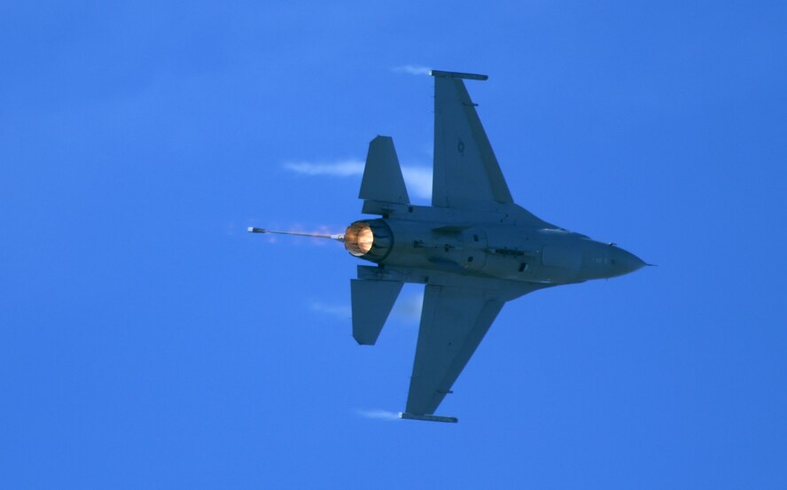 Afterburner flares as vapor streams from a Viper West F-16 during a practice flight at Langley Air Force Base, Va., Feb. 1. (U.S. Air Force photo by Scott Knuteson)