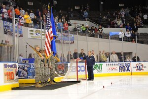 NORFOLK, Va. – Langley Air Force Base honor guardsman present the colors prior to the Norfolk Admirals and Binghamton Senators military appreciation game at the Norfolk Scope Arena Feb. 4. Col. Donald Kirkland, 633d Air Base Wing commander, tossed the puck for the start of the game, which ended in an Admirals’ win, 4-3. (U.S. Air Force Photo/Senior Airman Antoinette Gibson)(RELEASED)