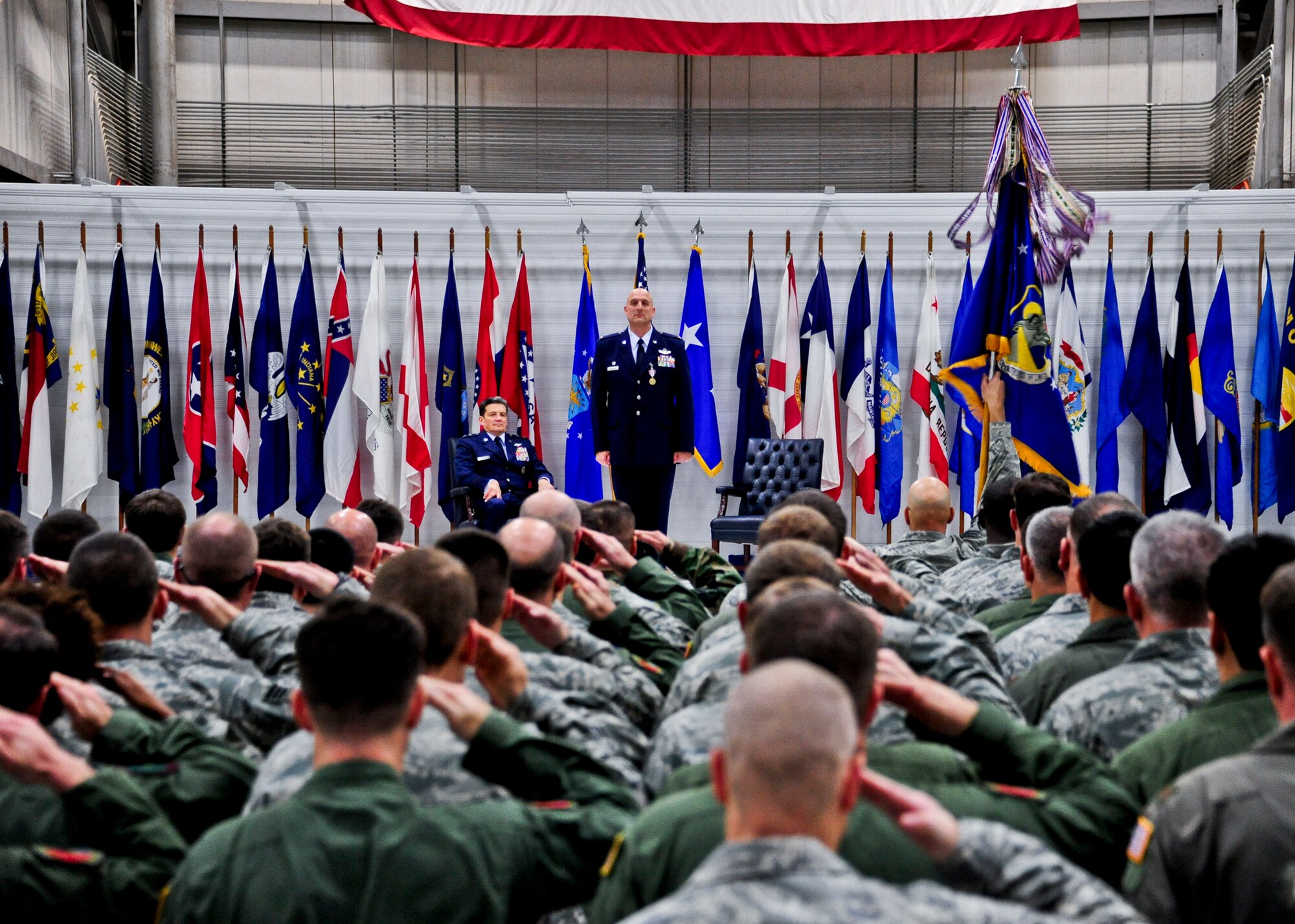919th Special Operations Wing Airmen salute their new commander, Col. Andy Comtois, during the assumption of command ceremony Feb. 5 at Duke Field, Fla. Colonel Comtois assumed command of the Air Force Reserve’s most decorated wing in the formal ceremony in front of hundreds of Airmen and distinguished visitors.  (U.S. Air Force photo/Tech. Sgt. Samuel King Jr.)