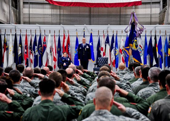 919th Special Operations Wing Airmen salute their new commander, Col. Andy Comtois, during the assumption of command ceremony Feb. 5 at Duke Field, Fla. Colonel Comtois assumed command of the Air Force Reserve’s most decorated wing in the formal ceremony in front of hundreds of Airmen and distinguished visitors.  (U.S. Air Force photo/Tech. Sgt. Samuel King Jr.)