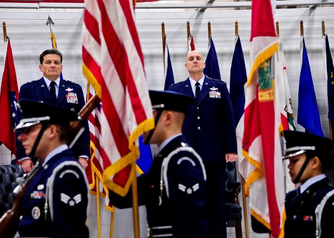 Maj. Gen. Frank J. Padilla, 10th Air Force commander, left, and Col. Andy Comtois, 919th Special Operations Wing commander, stand at attention for the presentation of the colors during the assumption of command ceremony Feb. 5 at Duke Field, Fla. Colonel Comtois assumed command of the Air Force Reserve’s most decorated wing in the formal ceremony in front of hundreds of Airmen and distinguished visitors.  (U.S. Air Force photo/Tech. Sgt. Samuel King Jr.)