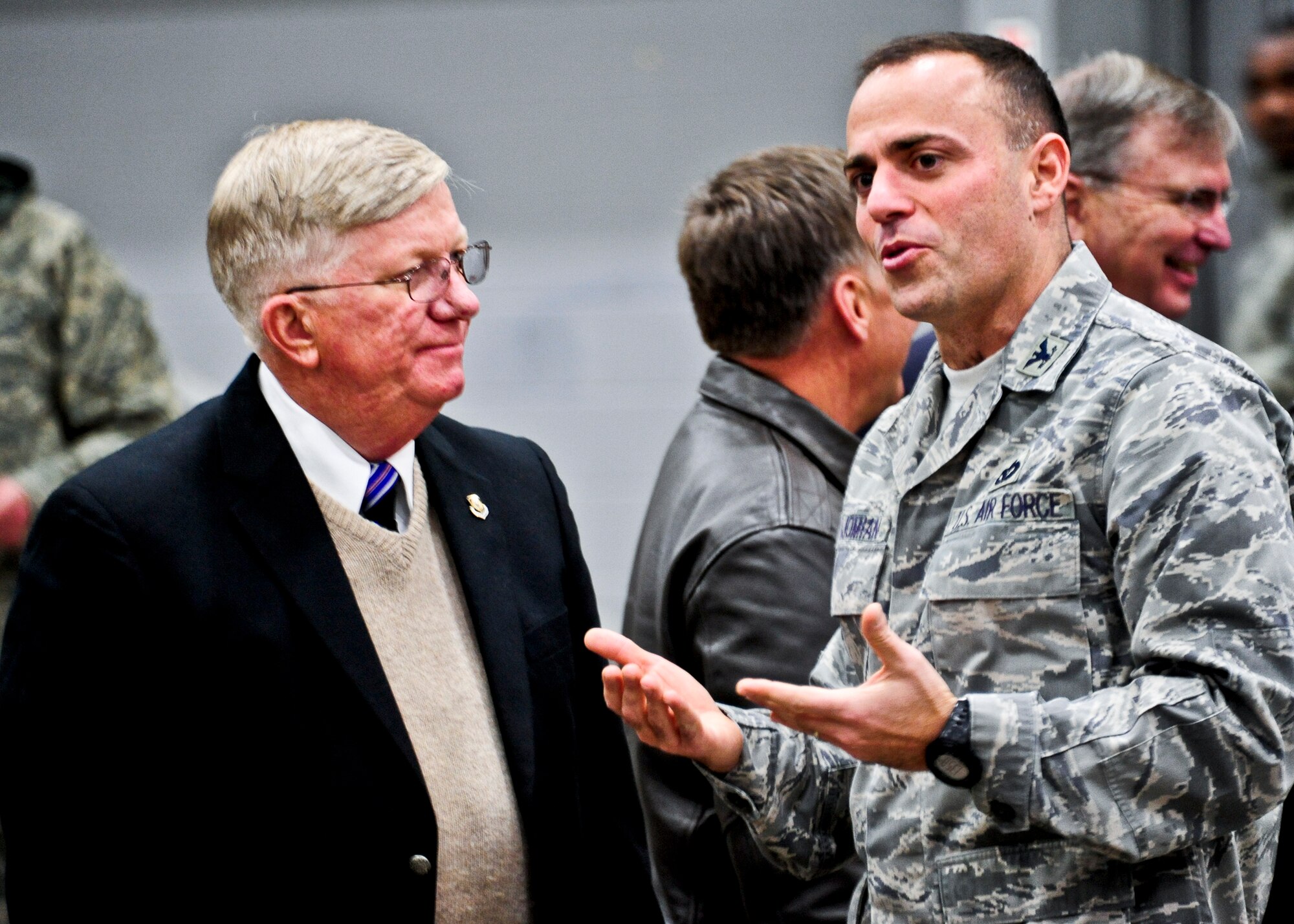 Colonel Sal Nodjomian, 96th Air Base Wing commander, reconnects with former Reserve general officer Clay McCutchan prior to the 919th Special Operations Wing assumption of command ceremony Feb. 5 at Duke Field, Fla.  Col. Andy Comtois assumed command of the Air Force Reserve’s most decorated wing in the formal ceremony in front of hundreds of Airmen and distinguished visitors.   (U.S. Air Force photo/Tech. Sgt. Samuel King Jr.)
