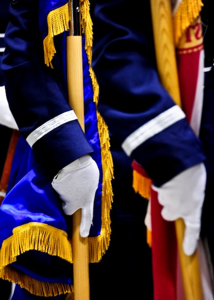 Honor guard members hold the flags steady  prior to the 919th Special Operations Wing assumption of command ceremony Feb. 5 at Duke Field, Fla.  Colonel Comtois assumed command of the Air Force Reserve’s most decorated wing in the formal ceremony in front of hundreds of Airmen and distinguished visitors.   (U.S. Air Force photo/Tech. Sgt. Samuel King Jr.)