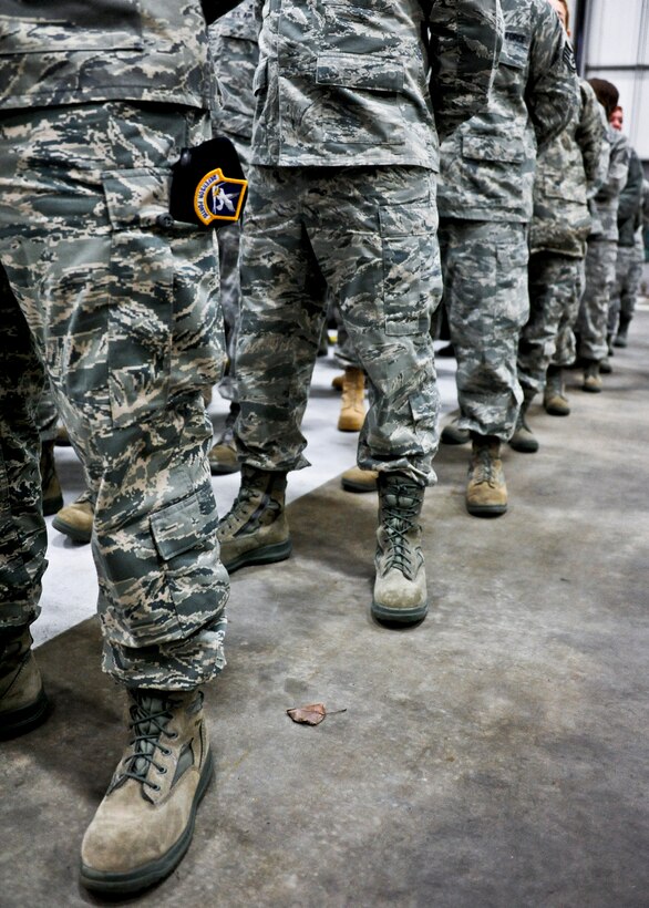 A formation of 919th Special Operations Wing Airmen stands at parade rest moments before the assumption of command ceremony Feb. 5 at Duke Field, Fla.  Col. Andy Comtois assumed command of the Air Force Reserve’s most decorated wing in the formal ceremony in front of hundreds of Airmen and distinguished visitors. 