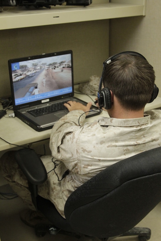 A Marine from 2nd Combat Engineer Battalion trains on the Deployable Virtual Training Environment at the Battle Simulation Center in Camp Wilson Feb. 8, 2011.