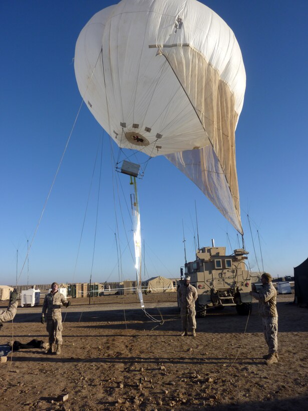 U.S. Marines attached to Battalion Landing Team 3/8, Regimental Combat Team 8, launch the lofted communication balloon for tethered deployment at Combat Outpost Ouellette, Helmand province, Afghanistan, Feb. 8, 2011. This was the first use of lofted comms in support of Marine Corps operations. 26th MEU Marines have tested and refined the system in exercises since 2009. Elements of 26th Marine Expeditionary Unit deployed to Afghanistan to provide regional security in Helmand province in support of the International Security Assistance Force.
