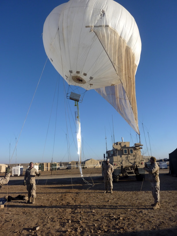 U.S. Marines attached to Battalion Landing Team 3/8, Regimental Combat Team 8, launch the lofted communication balloon for tethered deployment at Combat Outpost Ouellette, Helmand province, Afghanistan, Feb. 8, 2011. This was the first use of lofted comms in support of Marine Corps operations. 26th MEU Marines have tested and refined the system in exercises since 2009. Elements of 26th Marine Expeditionary Unit deployed to Afghanistan to provide regional security in Helmand province in support of the International Security Assistance Force.