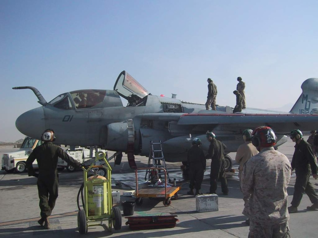 Maintenance Marines with Marine Tactical Electronic Warfare Squadron 3 of the 2nd Marine Aircraft Wing conduct preflight inspections on an EA-6B Prowler at Bagram Airfield, Afghanistan, Feb. 8. The maintenance Marines have surpassed more than 7,460 direct maintenance man-hours while in Afghanistan.