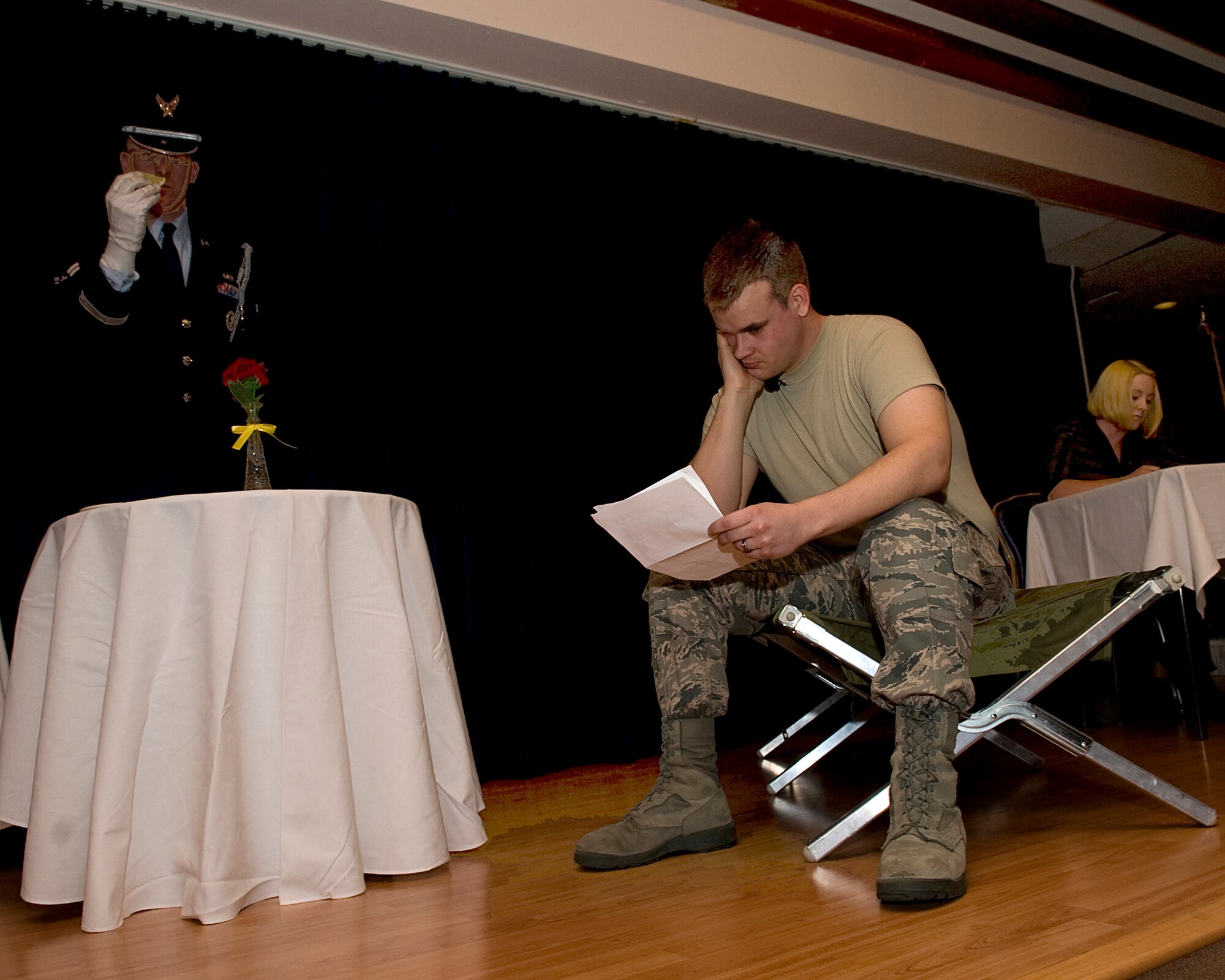 MOUNTAIN HOME AIR FORCE BASE, Idaho -- Airman 1st Class Michael Wise, 366th Operation Support Squadron, Airman 1st Class Jacob Maus, 366th Medical Operation Squadron, and Lyndsi Skipper, 366th Medical Surgical Squadron, perform an MIA/POW skit during the 2010 Annual Awards Ceremony here Feb. 4. The ceremony allowed 15 Airmen and civilians to be recognized for their accomplishments throughout 2010. (U.S. Air Force photo by Staff Sgt. Roy Lynch)