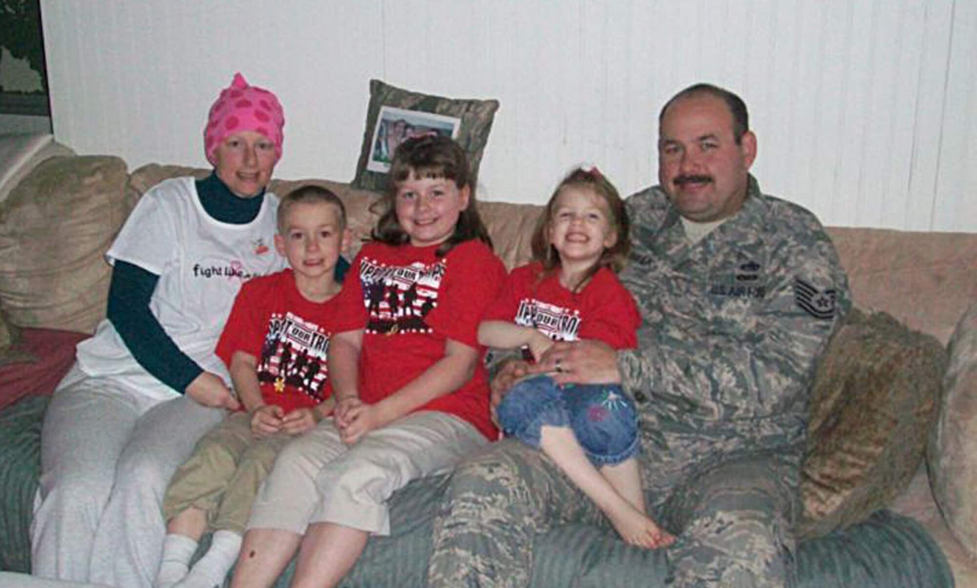 From left to right, Candice, Christopher, Cheyenne, Savannah, and Tech. Sgt. Chris Currier, 86th Aerial Port Squadron, McChord Field, Wash., were reunited as a family in January 2011. Candice battled breast cancer while her husband was deployed to Iraq from September 2010 through January 2011. (Courtesy photo)