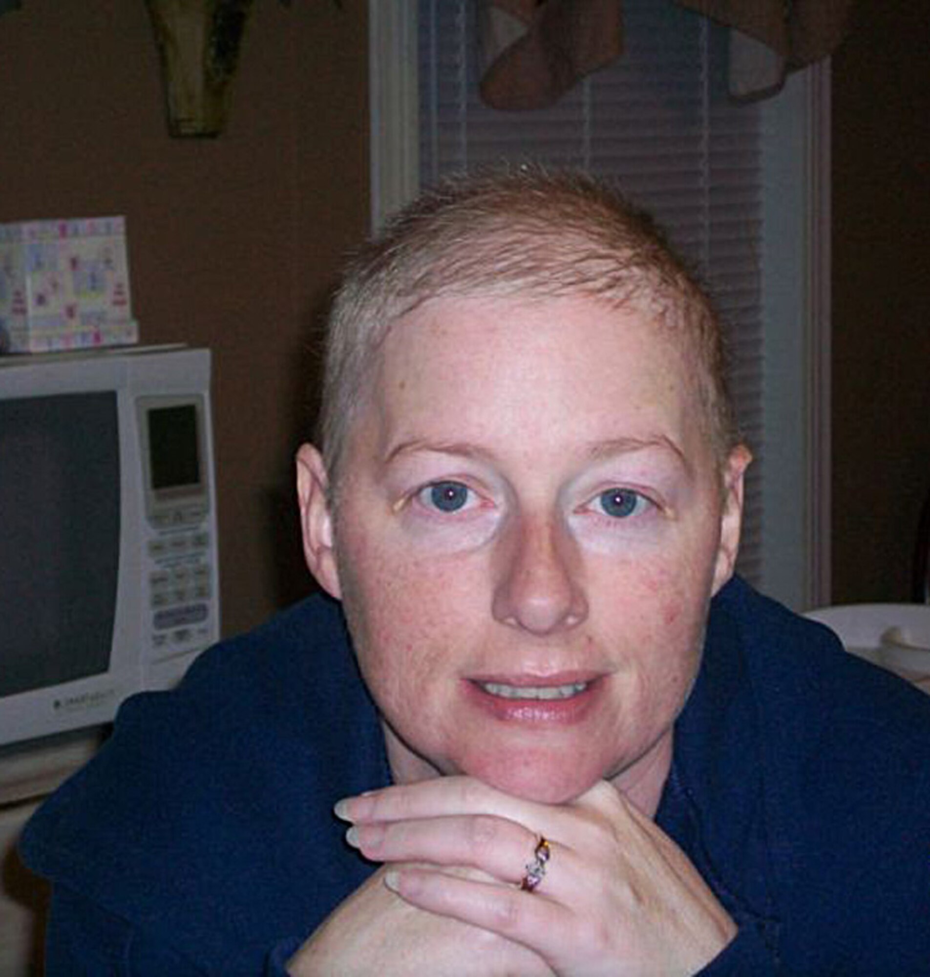 Candice, wife of Tech. Sgt. Chris Currier, 86th Aerial Port Squadron, McChord Field, Wash., battled breast cancer while her husband was deployed to Iraq from September 2010 through January 2011 (Courtesy photo)