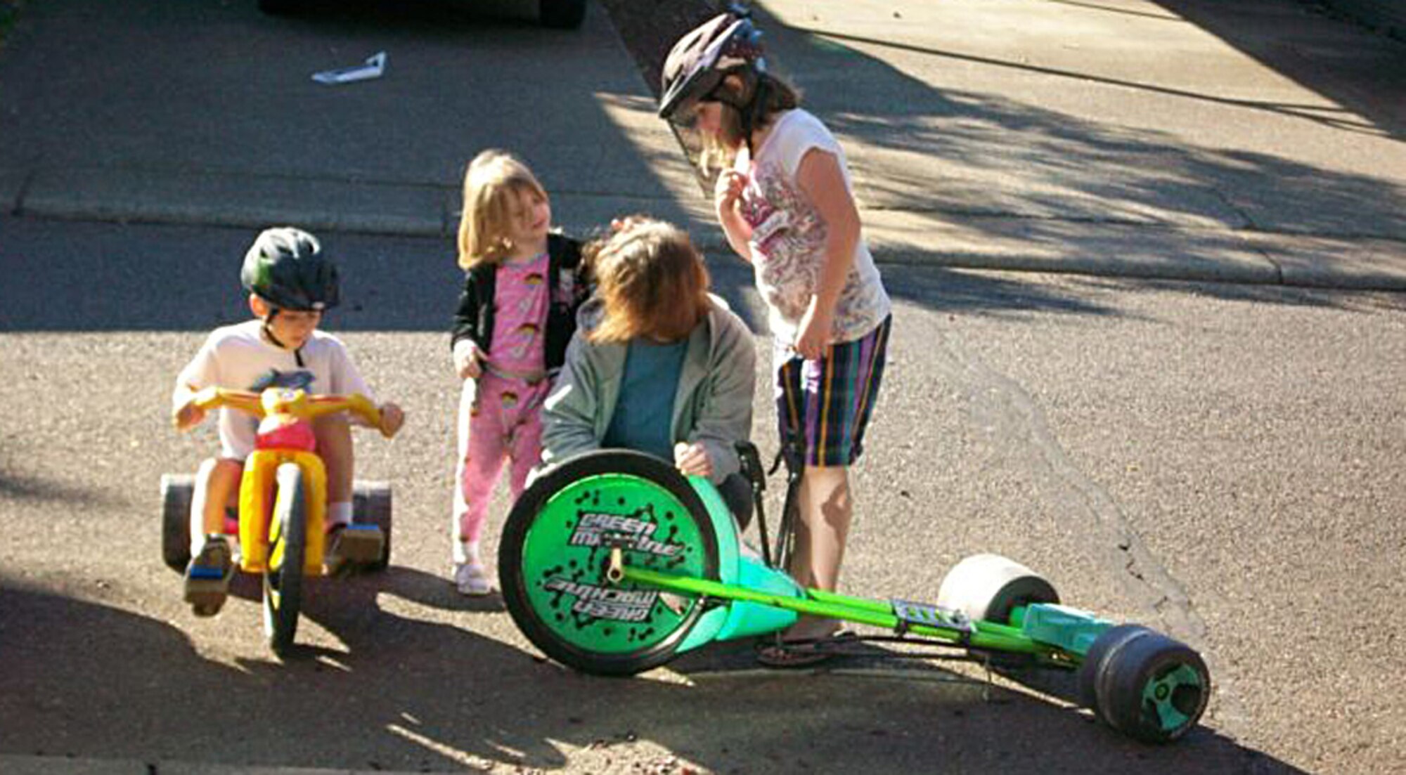 Candice Currier (third from left), had a little fun at her own expense when she engaged her children in a hair-pulling party.  Candice, wife of Tech. Sgt. Chris Currier, 86th Aerial Port Squadron, McChord Field, Wash., battled breast cancer while her husband was deployed to Iraq. (Courtesy photo)