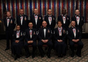 Ten of Team Charleston's 12 chief master sergeant inductees were in attendance at the Joint Base Charleston's chief induction ceremony here, Feb. 5. Chief master sergeants make up one percent of the Air fForce's enlisted force. Not pictured due to deployment are Chief Master Sergeant Selects Michael Gibson and Jeffrey Leeson. (I.S. Air Force photo/Senior Airman Katie Gieratz)
