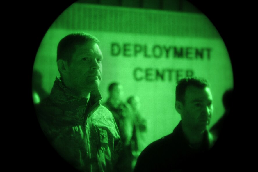 MOODY AIR FORCE BASE, Ga.-- Col. Gary Henderson, 23rd Wing commander, waits for the arrival of nearly 70 Moody members with Col. Chad Franks, 347th Rescue Group commander, Feb. 8. Commanders, supervisors and family members came in the early morning hours to supports Airmen returning from a deployment in Southwest Asia. (U.S. Air Force photo/Airman 1st Class Benjamin Wiseman)(RELEASED)