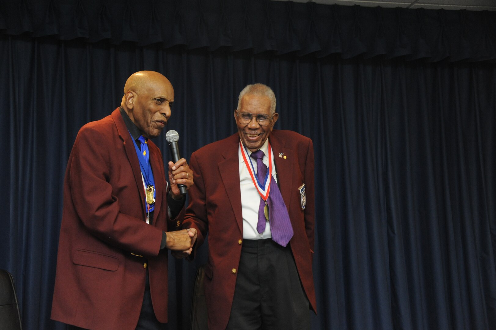 Randolph Air Force Base, Texas:  (Lt. Colonel) Dr. Granville C. Coggs, M.D., and (Sergeant) Warren Eusan, Documented Original Tuskegee Airmen, Stand together as they Address the audience at the Third Annual Tuskegee Heritage Breakfast.  The Beakfast is held at the 99th Flying Training Squadron on Randolph Air Force Base.  (U.S. Air Force photo/Rich McFadden)