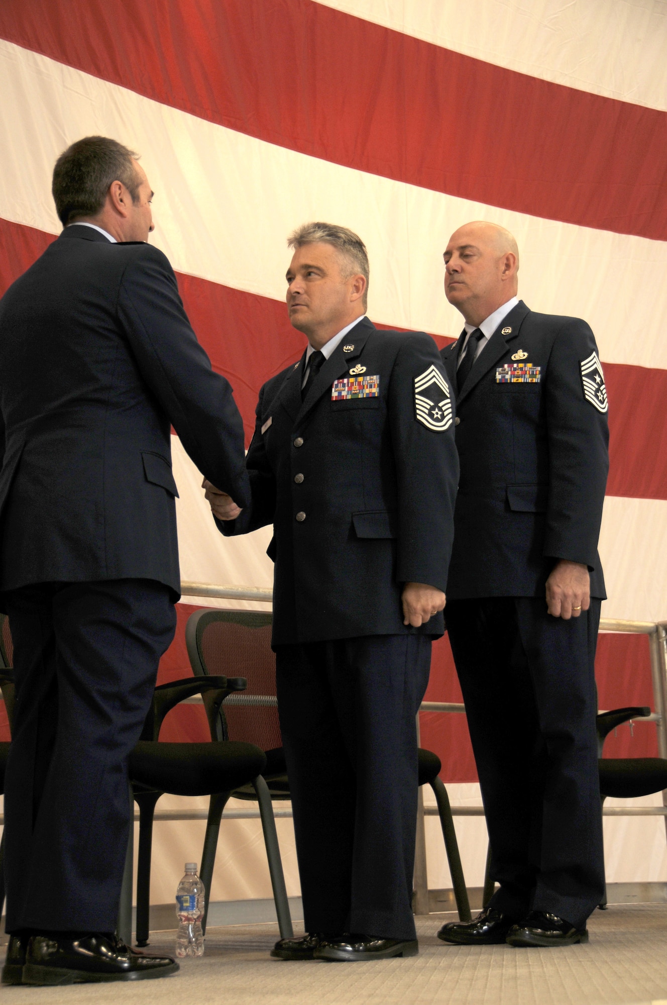 PHOENIX, AZ-- A Change of Responsibility Ceremony took place at 161st Air Refueling Wing, Saturday, Feb. 5, 2011. Chief Master Sgt. Johnny Smith, former State Human Resource Advisor replaces Command Chief Master Sgt. James Nedved as the 161st ARW Command Chief. (U.S. Air Force photo/ Airman 1st Class Rashaunda Williams/Released)