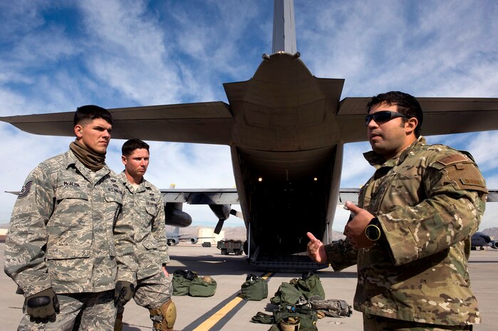 NELLIS AIR FORCE BASE, Nev.-- Staff Sgt. Paul Merck, Survival Evasion Resistance Escape specialist with the 38th Rescue Squadron, Moody Air Force Base, Ga. briefs members of the 820th Rapid Engineer Deployable Heavy Operational Repair Squadron Engineers before departing for a Red Flag mission over the Nevada Test and Training Range  Feb. 4.. Red Flag is a realistic combat training exercise involving the air forces of the United States and its allies. The exercise is hosted north of Las Vegas on the Nevada Test and Training Range. (U.S. Air Force photo by Senior Airman Brett Clashman)