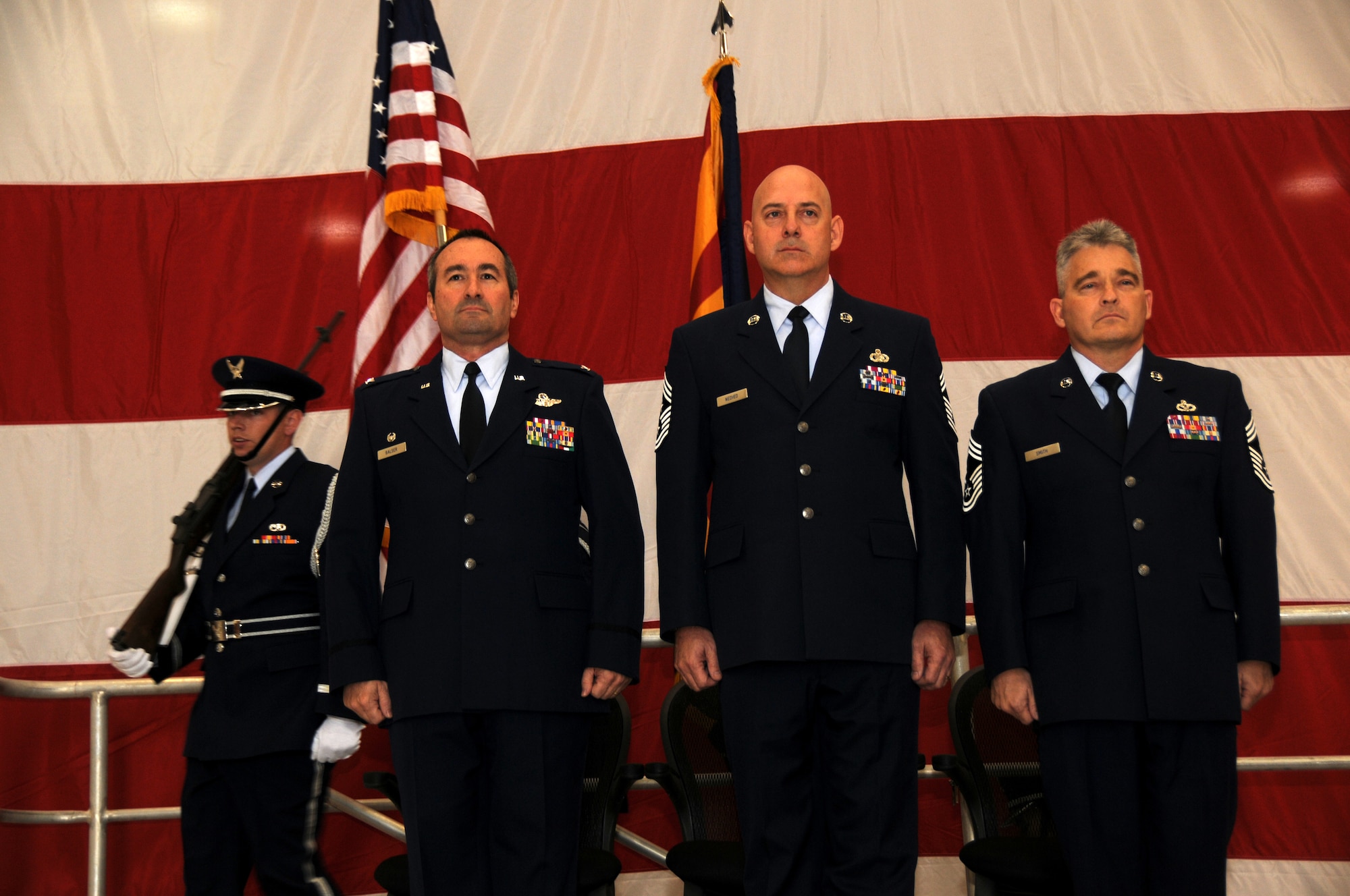 PHOENIX, AZ-- A Change of Responsibility Ceremony took place at 161st Air Refueling Wing, Saturday, Feb. 5, 2011. Chief Master Sgt. Johnny Smith, former State Human Resource Advisor replaces Command Chief Master Sgt. James Nedved as the 161st ARW Command Chief. (U.S. Air Force photo/ Airman 1st Class Rashaunda Williams/Released)