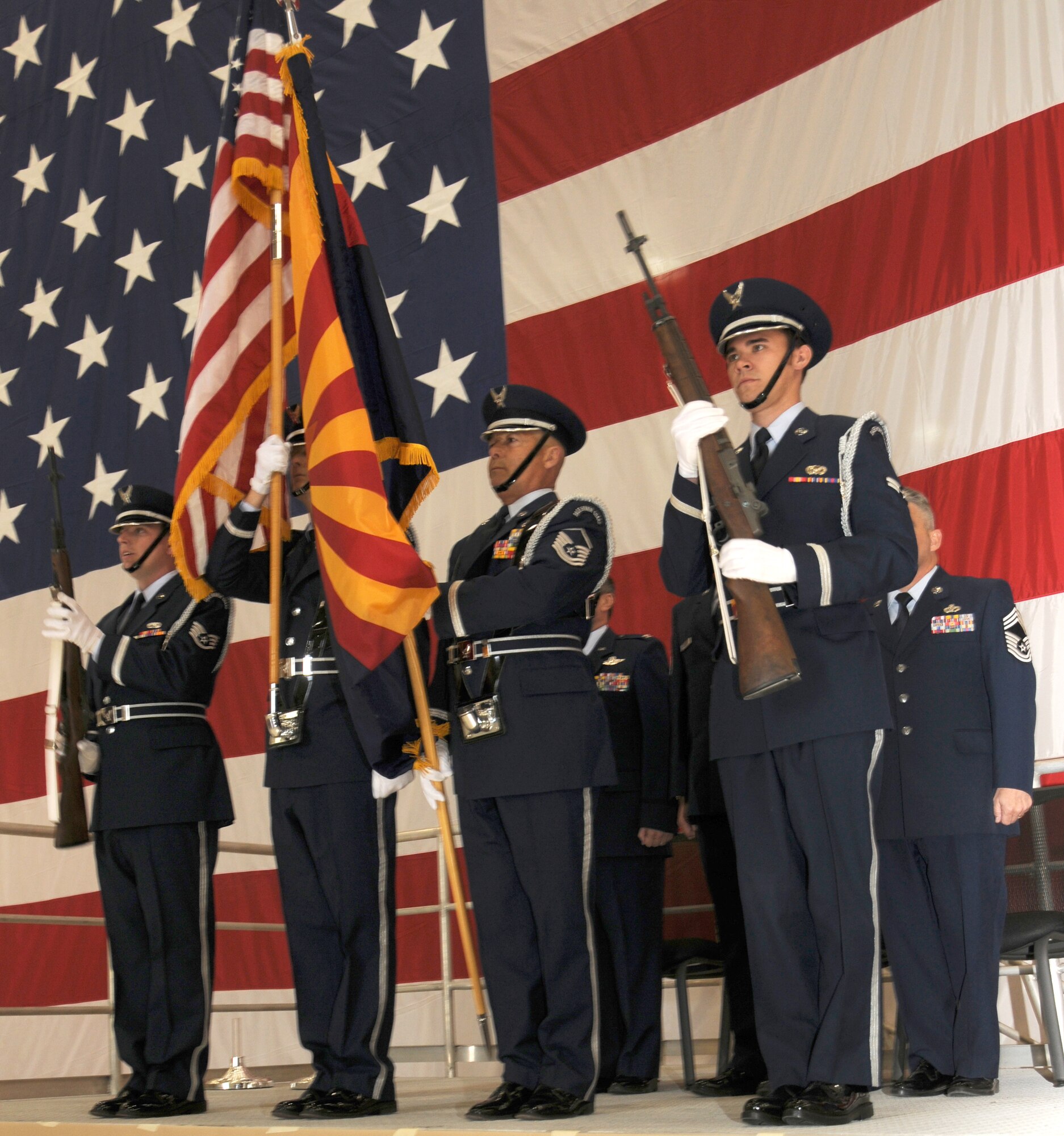PHOENIX, AZ-- A Change of Responsibility Ceremony took place at 161st Air Refueling Wing, Saturday, Feb. 5, 2011. Chief Master Sgt. Johnny Smith, former State Human Resource Advisor replaces Command Chief Master Sgt. James Nedved as the 161st ARW Command Chief. (U.S. Air Force photo/ Airman 1st Class Rashaunda Williams/Released)