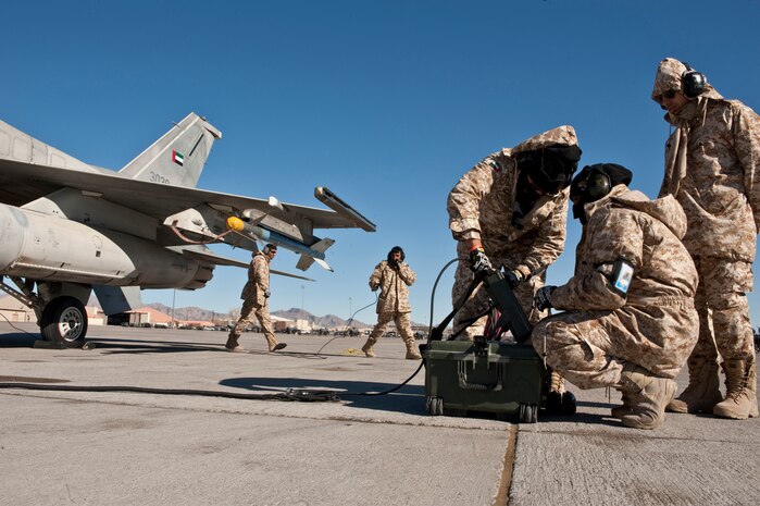 NELLIS AIR FORCE BASE, Nev.--United Arab Emirates, Saheen 3 Squadron crew chief's, conduct an engine test on a F-16E Desert Falcon during Red Flag 11-2 Feb. 2. Red Flag is a realistic combat training exercise involving the air forces of the United States and its allies. The exercise is hosted north of Las Vegas on the Nevada Test and Training Range.(U.S. Air Force photo by Tech. Sgt. Michael R. Holzworth)
