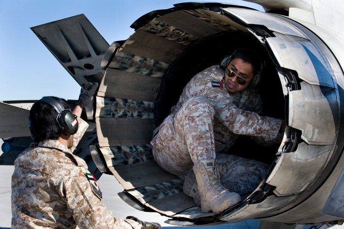 NELLIS AIR FORCE BASE, Nev.--United Arab Emirates, Sgt. Maj. Abdul Alkalar, Saheen 3 Squadron crew chief, checks the exhaust of an F-16E Desert Falcon during Red Flag 11-2 Feb. 1. Red Flag is a realistic combat training exercise involving the air forces of the United States and its allies. The exercise is hosted north of Las Vegas on the Nevada Test and Training Range. (U.S. Air Force photo by Senior Airman Brett Clashman)