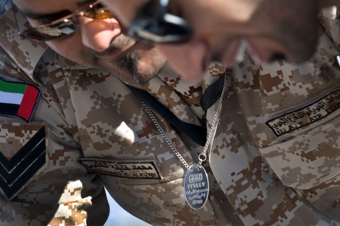 NELLIS AIR FORCE BASE, Nev.--United Arab Emirates, Sgt. Mohammed Alkutbi, Saheen 3 Squadron crew chief, looks over a pre-flight checklist during Red Flag 11-2  Feb. 1. Red Flag is a realistic combat training exercise involving the air forces of the United States and its allies. The exercise is hosted north of Las Vegas on the Nevada Test and Training Range. (U.S. Air Force photo by Senior Airman Brett Clashman)