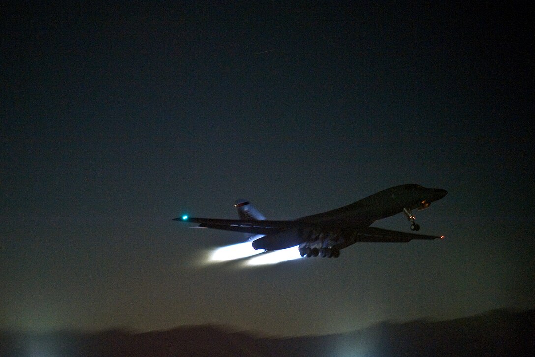 NELLIS AIR FORCE BASE, Nev. -- A B-1 Lancer from the 34th Bomber Squadron, Ellsworth Air Force Base Alaska, takes off for a night training mission during Red Flag 11-2, Jan. 26. Red Flag is a realistic combat training exercise involving the air forces of the United States and its allies. The exercise is hosted north of Las Vegas on the Nevada Test and Training Range. (U.S. Air Force photo by Tech. Sgt. Michael R. Holzworth)
