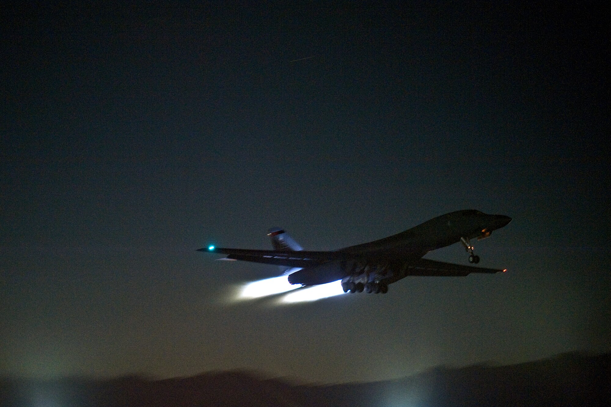 NELLIS AIR FORCE BASE, Nev. -- A B-1 Lancer from the 34th Bomber Squadron, Ellsworth Air Force Base Alaska, takes off for a night training mission during Red Flag 11-2, Jan. 26. Red Flag is a realistic combat training exercise involving the air forces of the United States and its allies. The exercise is hosted north of Las Vegas on the Nevada Test and Training Range. (U.S. Air Force photo by Tech. Sgt. Michael R. Holzworth)

