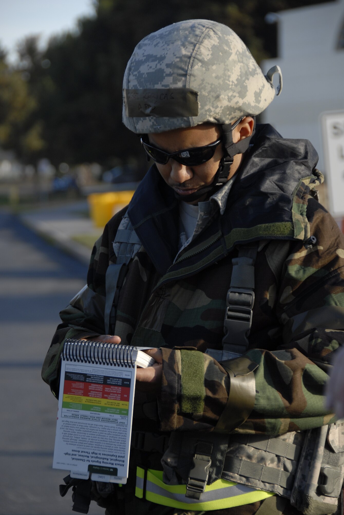 Staff Sgt. Ricky Karicas, a security forces craftsman from the 129th Security Forces Squadron, reviews his AFMAN 10-100, or Airman's Manual, during war skills training at Moffett Federal Airfield, Calif., Feb. 5, 2011. The 129th Rescue Wing is preparing for an upcoming Operational Readiness Inspection in December 2011. (Air National Guard photo by Tech. Sgt. Ray Aquino/RELEASED)