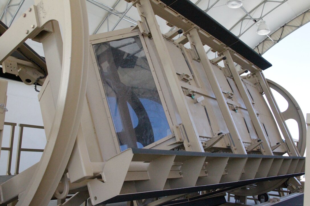 The Mine Resistant Ambush Protected (MRAP)  Egress Trainer, a roll-over simulator at the Battle Simulation Center in Camp Wilson, rolls during a training session with 2nd Combat Engineer Battalion from Marine Corps Base Camp Lejuene, N.C., Feb. 9, 2011.::r::::n::