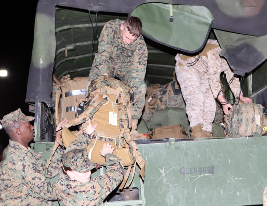 Marines with 2nd Marine Aircraft Wing (Forward) load a truck with gear bound for Afghanistan’s Helmand province prior to departing Marine Corps Air Station Cherry Point Feb. 9.