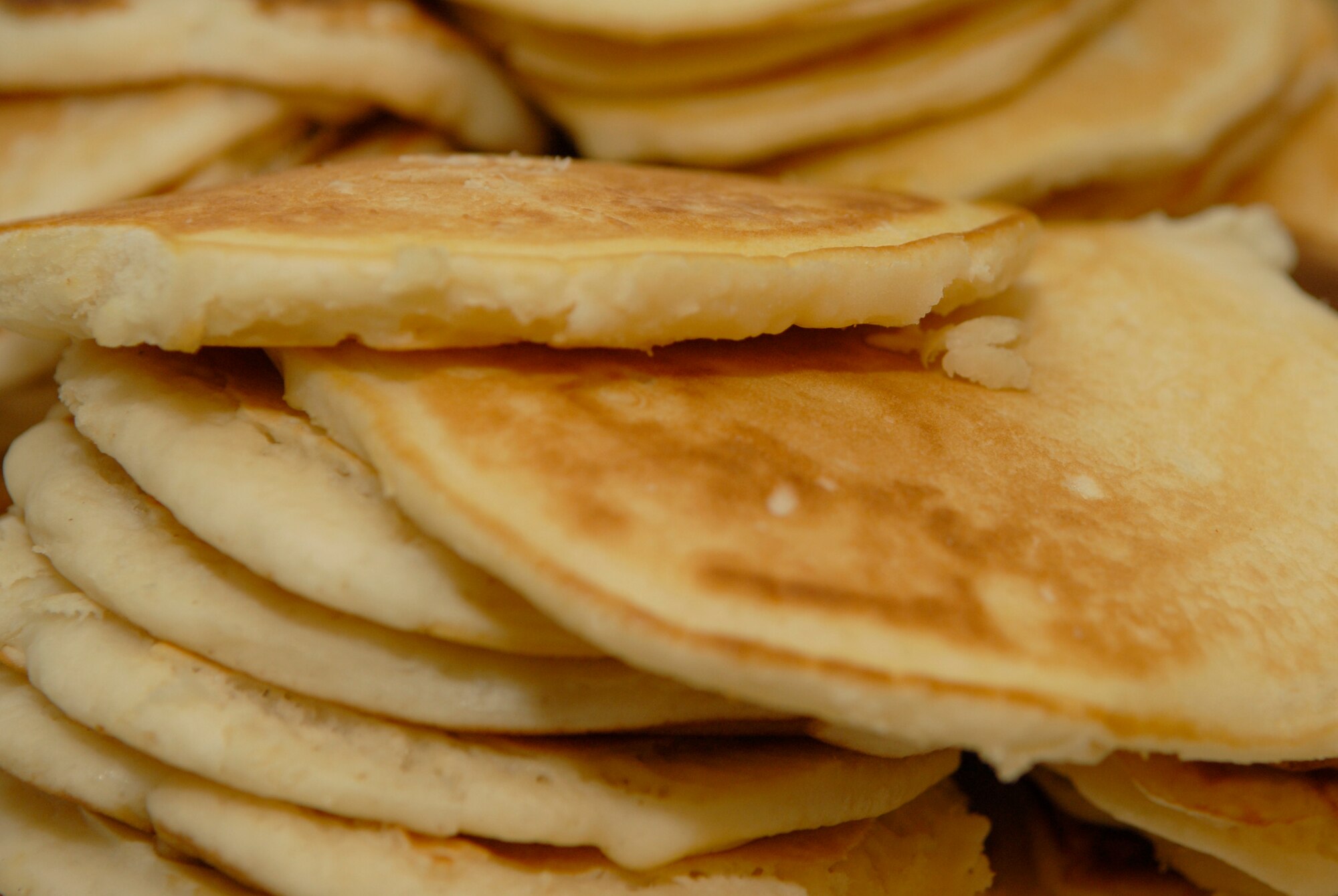VANDENBERG AIR FORCE BASE, Calif. --  The 1st Sgt.'s Council Pancake Breakfast event was held at the Airman and Family Readiness Center here Friday, Feb. 4, 2011.  The council sold more than 500 breakfast plates raising more than  $1,300 dollars for the Vandenberg Food Pantry.  (U.S. Air Force photo/Senior Airman Andrew Satran) 

 
 
 
 