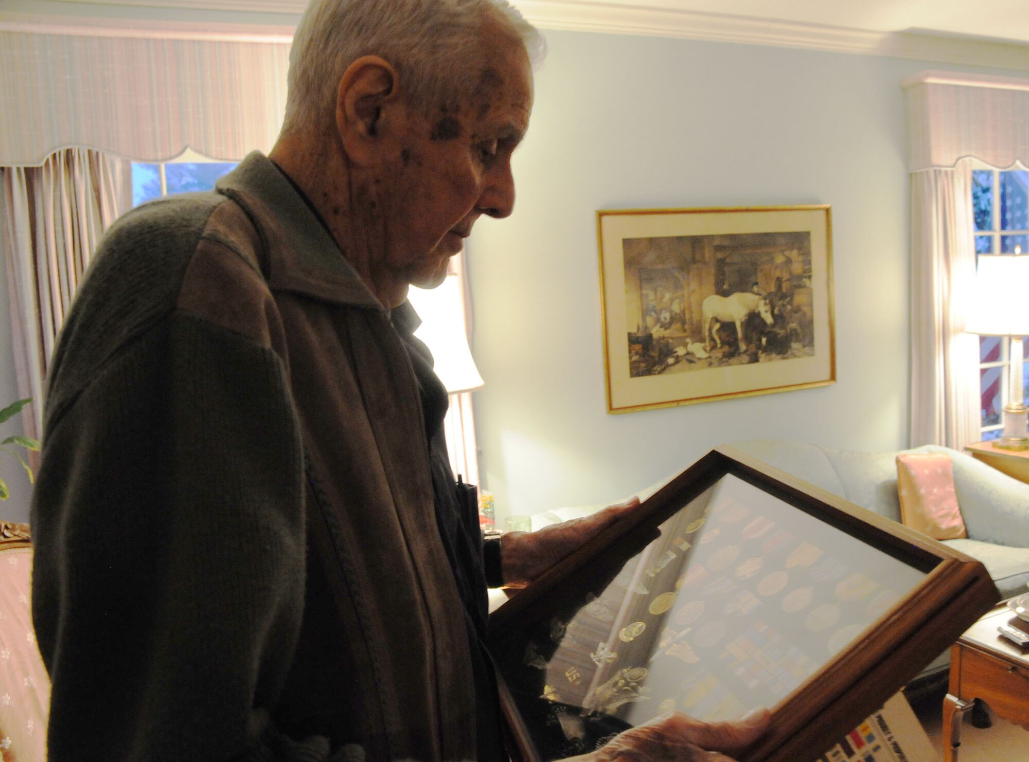 Louisville, Ky. -- The memories of a lifetime of service often come back to George Kinnaird.  Scanning the medals he earned during a military career spanning most of his life, the former colonel is never short of memories that would astound many pilots today.  (Official U.S. Air Force photo by Staff Sgt. Shawn C. Rhodes)