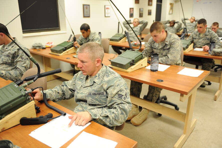 U.S. Air Force Tactical Air Control Party class Falcon 86 assembles and trouble shoots radios during a progress check at the TACP school house, Hurlburt Field, Fla., Jan. 26, 2011. The TACP training school involves rigorous academic and physical training standards. (U.S. Air Force photo by Airman 1st Class Caitlin O’Neil-McKeown/RELEASED)




