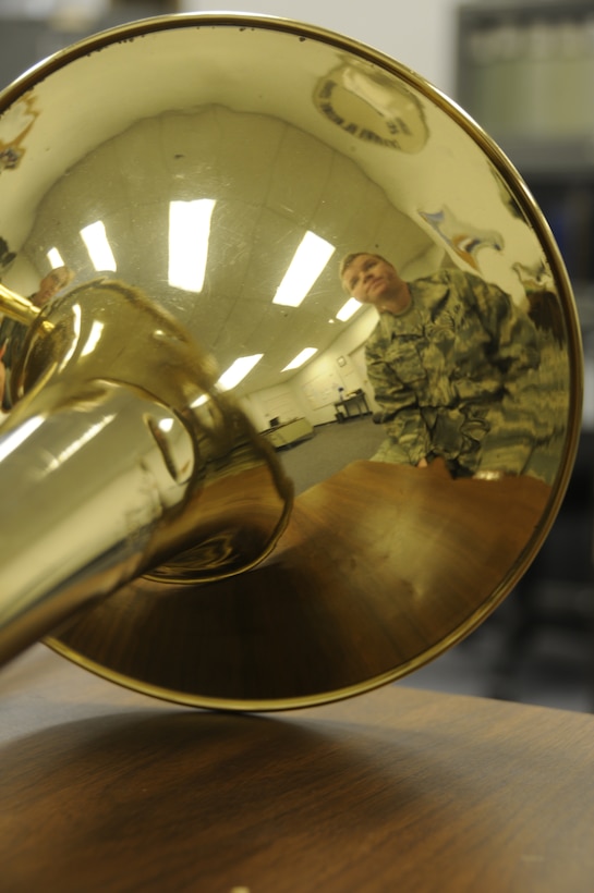 Staff Sgt. Jennifer Parks, a trombone player with the 561st Air Force Band, practices a musical composition at Moffett Federal Airfield, Calif., Dec. 15, 2010. (Air National Guard photo by Tech. Sgt. Ray Aquino/RELEASED)