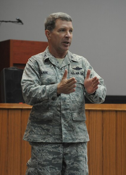 Col. David Slade, the director of assignments at the Air Force Personnel Center, speaks to servicemembers at the base theater, Jan. 28, 2011 at Incirlik Air Base, Turkey. The briefing was part of the AFPC  “Spread The Word” tour, and was intended to educate Airmen about personnel programs and to get feedback from Airmen in the field to ensure personnel center officials are meeting their mission of putting the right people in the right place at the right time. (U.S. Air Force Photo by Airman 1st Class Clayton Lenhardt/Released)